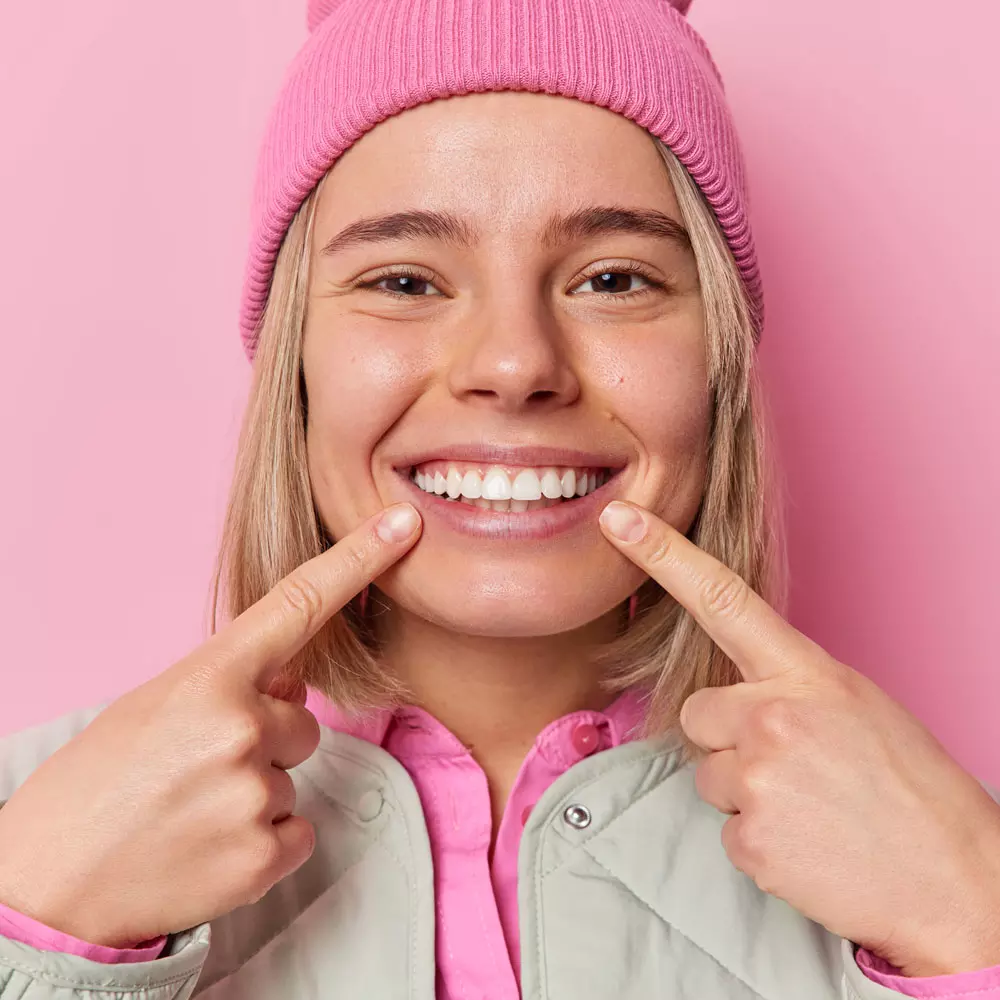 Home 14 cute positive caucasian woman happy after a tooth bondig treatment
